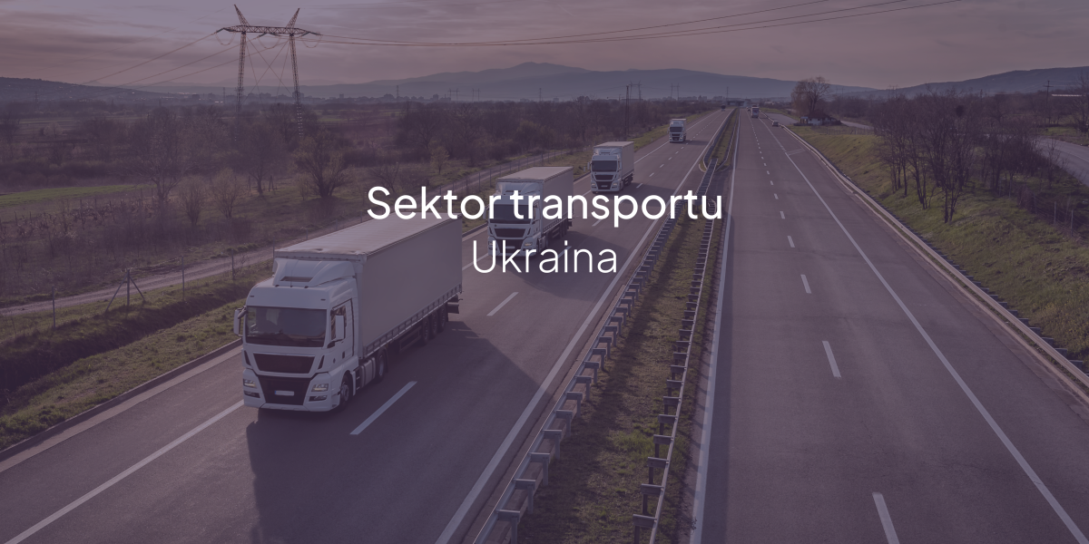 Napis "Sektor transportu Ukraina" na tle samochodu ciężarowego na szosie